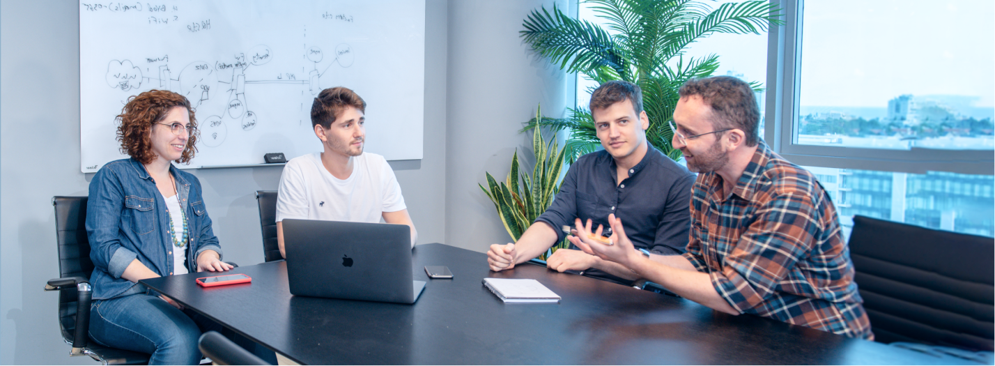 2 men sitting in office